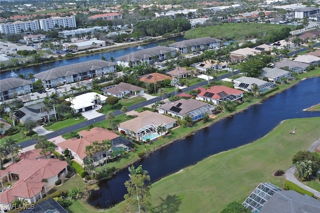 aerial view featuring a residential view and a water view