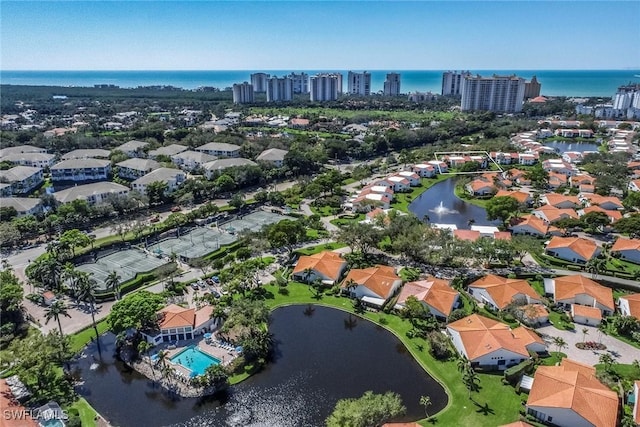 aerial view featuring a view of city and a water view