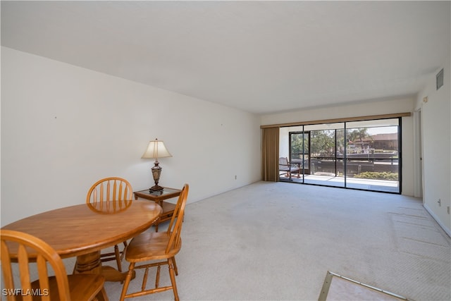 dining room with carpet floors