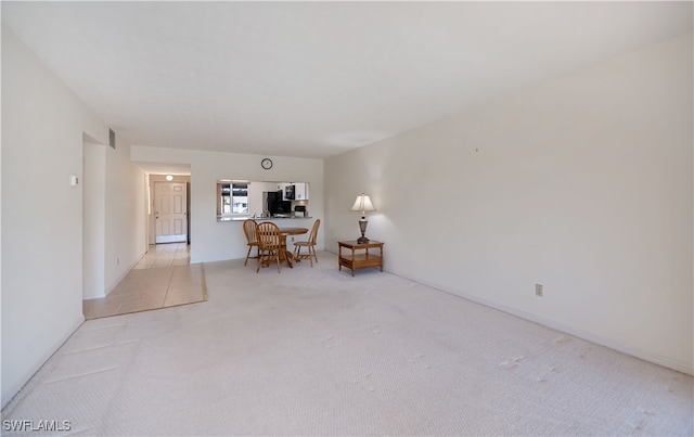 sitting room with carpet floors