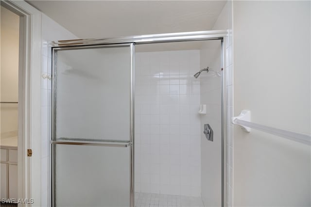 full bathroom with a stall shower