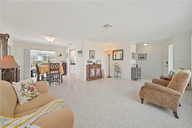 living area featuring visible vents