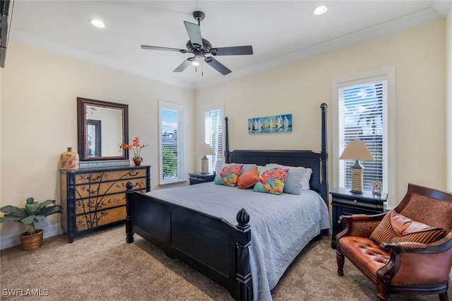 bedroom with recessed lighting, multiple windows, and light colored carpet