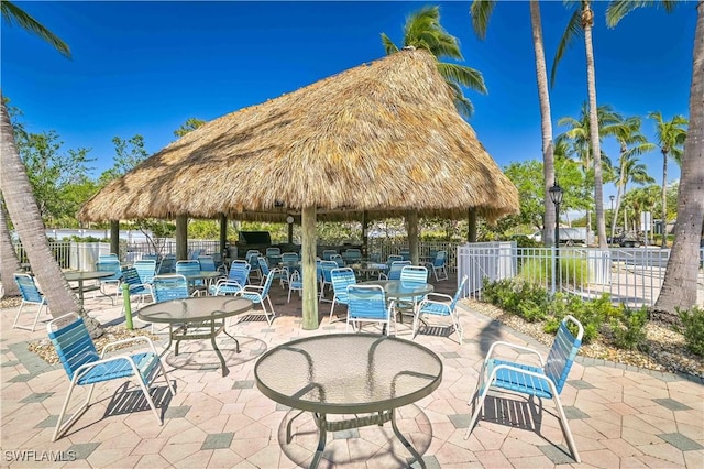 view of patio featuring a gazebo and fence