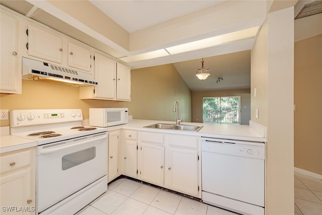 kitchen featuring white appliances, light countertops, a sink, and under cabinet range hood