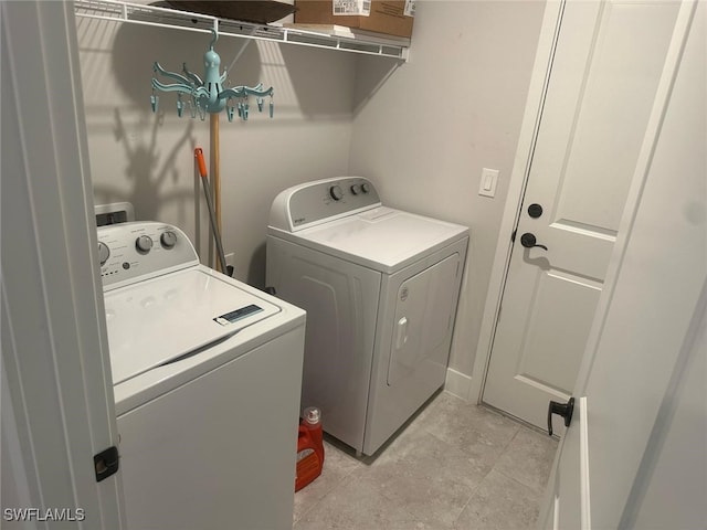 laundry room with laundry area and washer and dryer