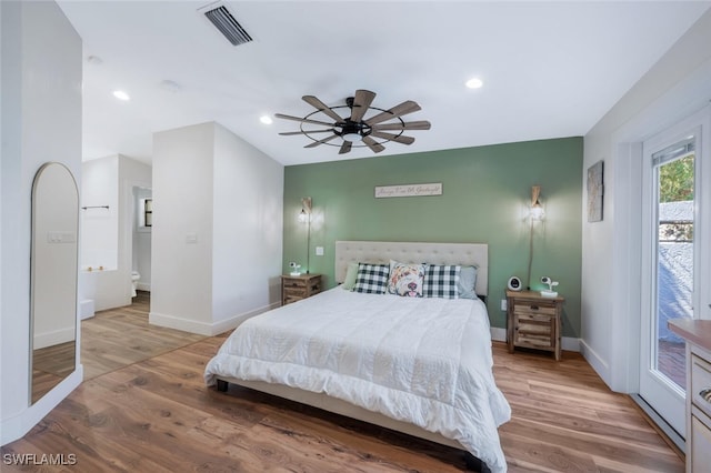 bedroom featuring recessed lighting, visible vents, baseboards, access to outside, and light wood-type flooring