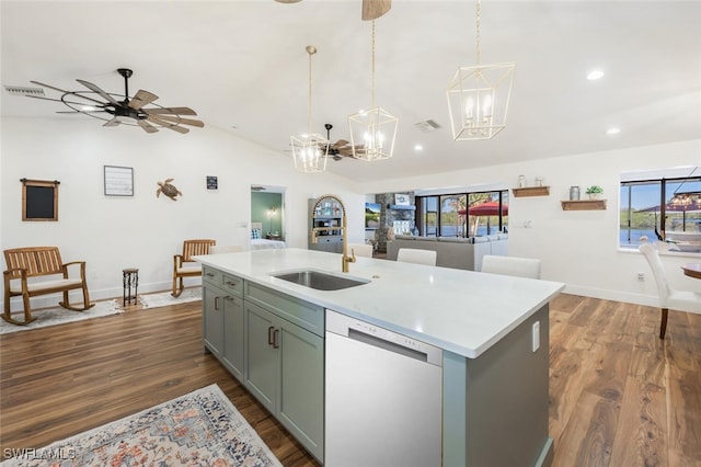 kitchen with lofted ceiling, stainless steel dishwasher, dark wood-type flooring, and a sink