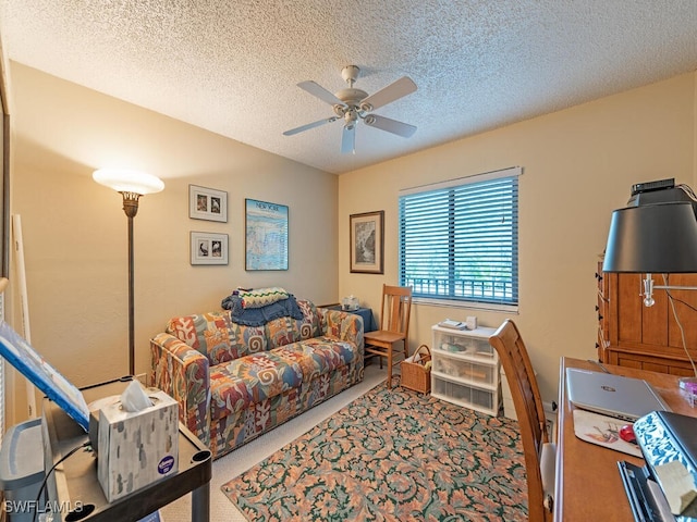 office with ceiling fan, carpet floors, and a textured ceiling