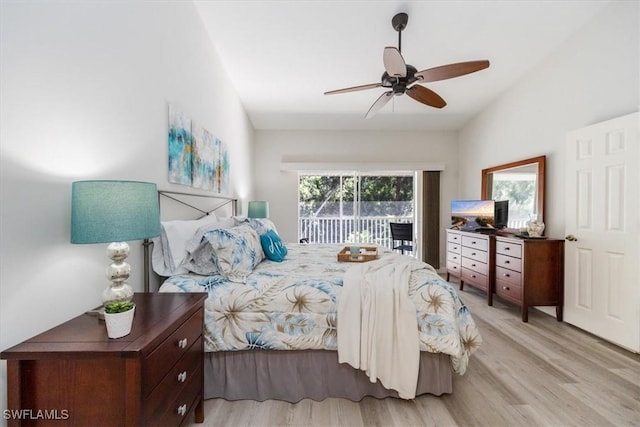 bedroom with light wood-type flooring, access to outside, ceiling fan, and lofted ceiling