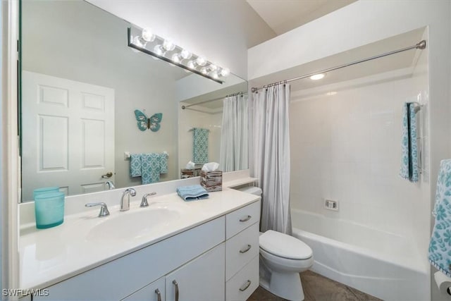 full bathroom featuring shower / tub combo with curtain, vanity, toilet, and tile patterned floors