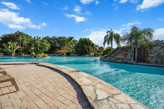 pool featuring a patio area