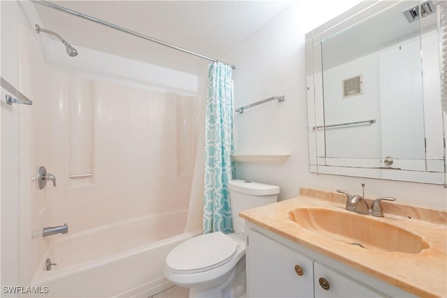 bathroom with visible vents, shower / tub combo with curtain, vanity, and toilet