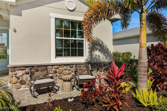 view of property exterior with stucco siding