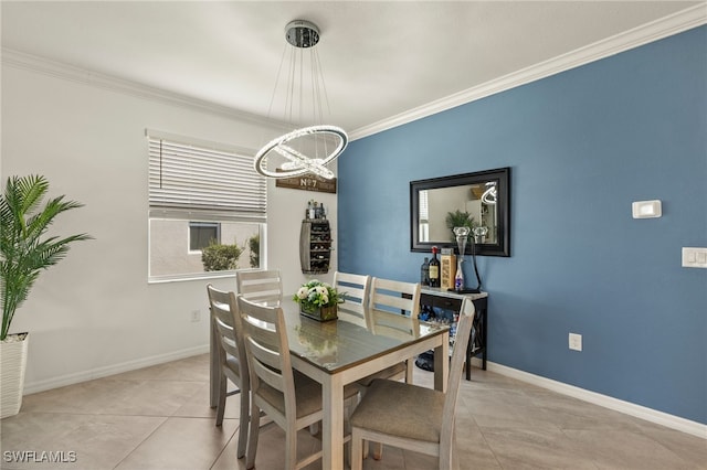 dining room featuring light tile patterned floors, baseboards, a chandelier, and crown molding