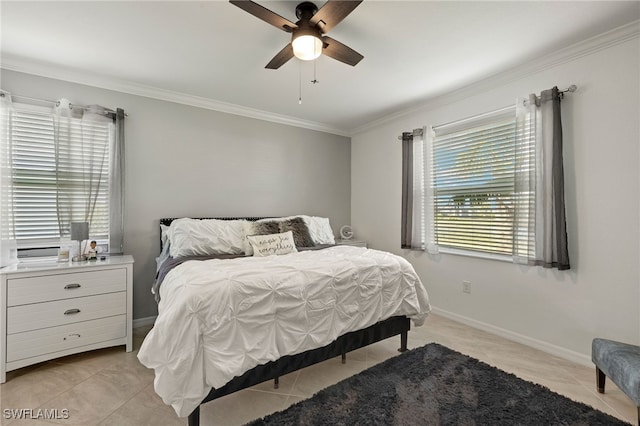 bedroom with baseboards, ceiling fan, light tile patterned flooring, and crown molding