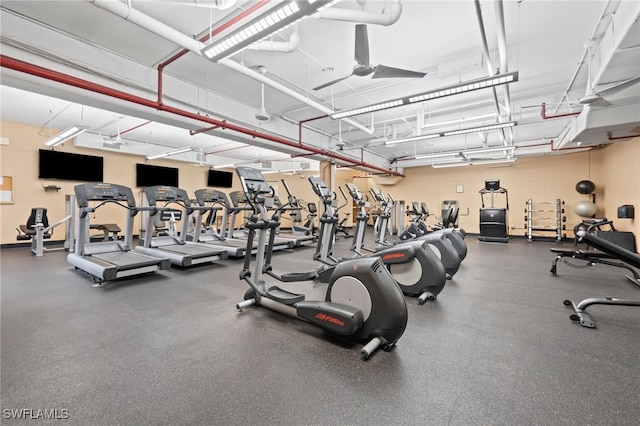 workout area with a ceiling fan