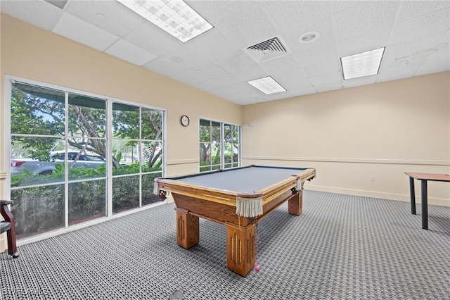 rec room featuring a paneled ceiling, carpet flooring, visible vents, and baseboards