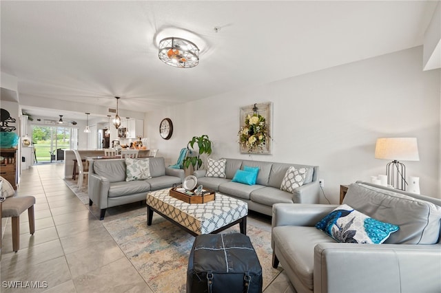 living area featuring light tile patterned floors