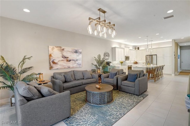 living room featuring recessed lighting, visible vents, baseboards, and light tile patterned flooring