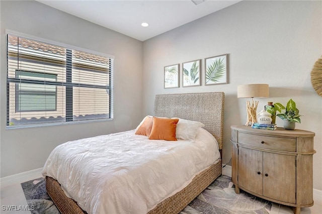 bedroom with recessed lighting and baseboards