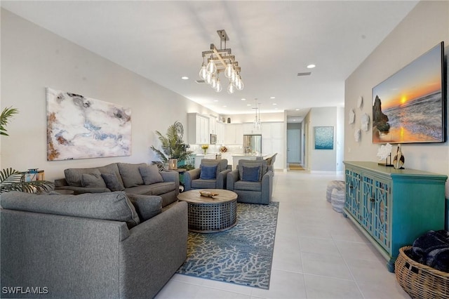 living area featuring recessed lighting, visible vents, and light tile patterned flooring