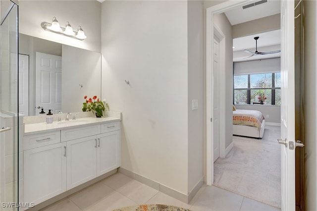 full bathroom with tile patterned flooring, visible vents, baseboards, and vanity