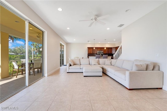 living room featuring ceiling fan, light tile patterned floors, visible vents, and recessed lighting