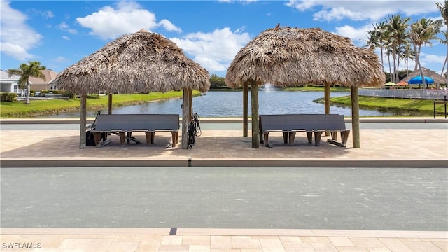 view of community featuring a water view and a gazebo