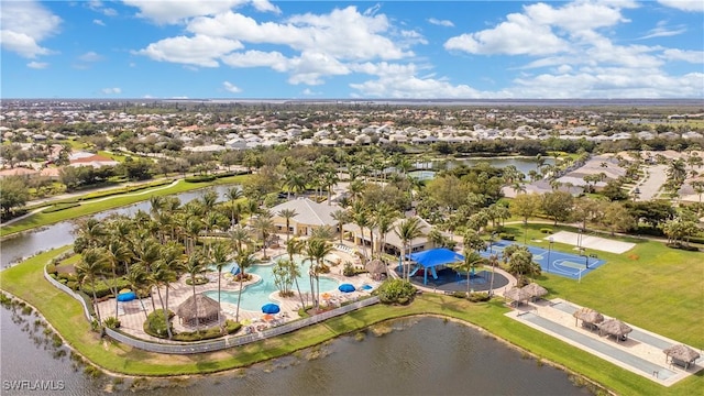 aerial view with a residential view and a water view