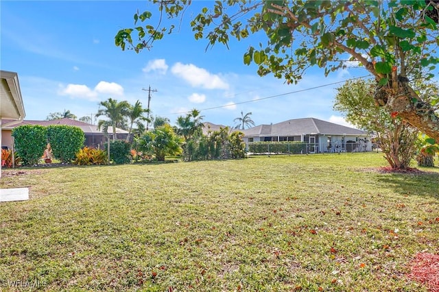 view of yard with fence