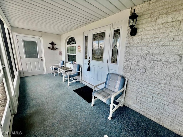 view of patio featuring covered porch