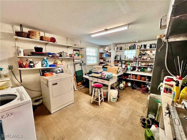 storage featuring washer and clothes dryer