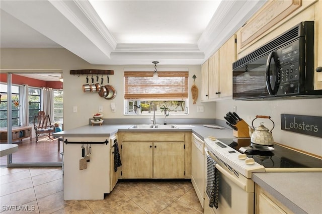 kitchen featuring light brown cabinets, white appliances, a sink, a raised ceiling, and crown molding