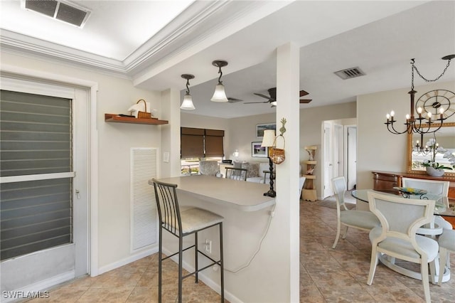 kitchen with ceiling fan with notable chandelier, decorative light fixtures, visible vents, and crown molding