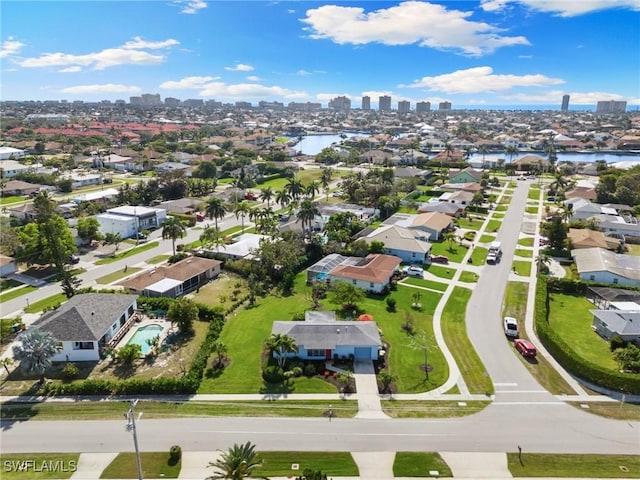 aerial view featuring a water view and a city view