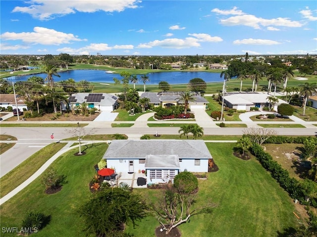 drone / aerial view with a water view