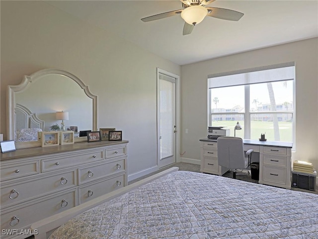 bedroom with a ceiling fan and baseboards