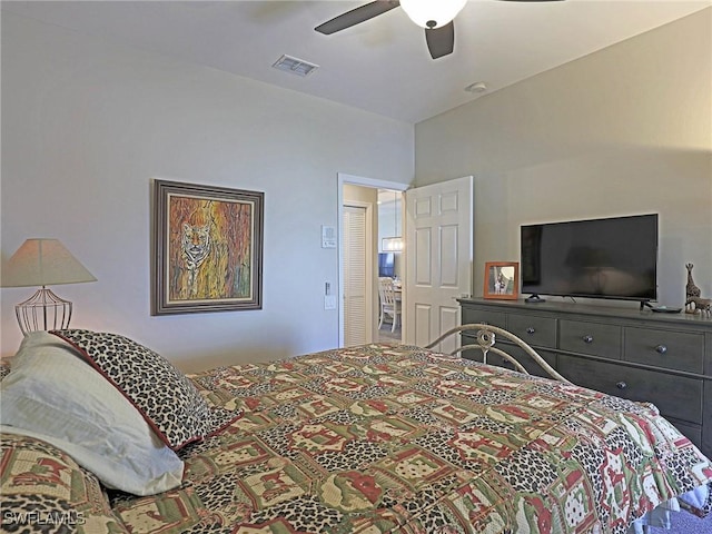 bedroom with ceiling fan and visible vents