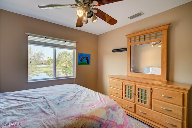 bedroom with visible vents and ceiling fan