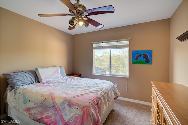 bedroom featuring carpet, baseboards, and ceiling fan