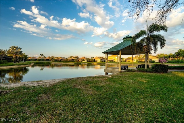 property view of water with a gazebo