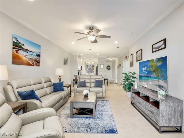 living area with light tile patterned floors, recessed lighting, ceiling fan with notable chandelier, and crown molding