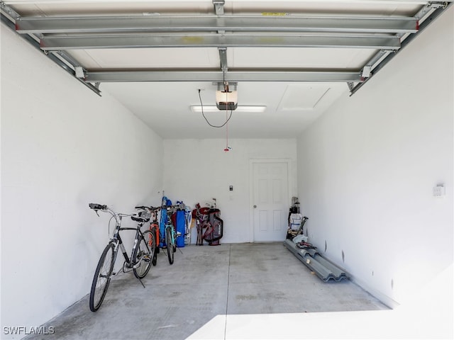 garage featuring a garage door opener