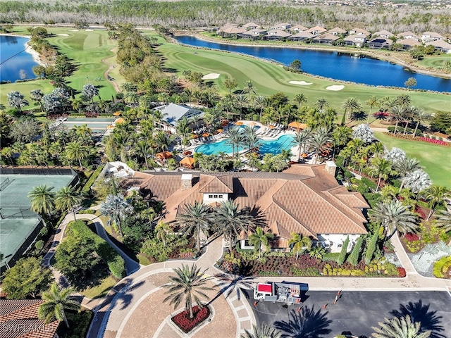 aerial view featuring view of golf course and a water view