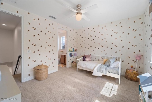 bedroom featuring carpet floors, wallpapered walls, baseboards, and visible vents