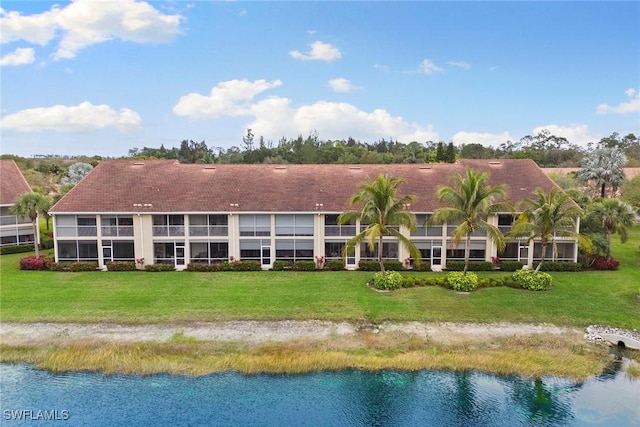 view of building exterior with a water view