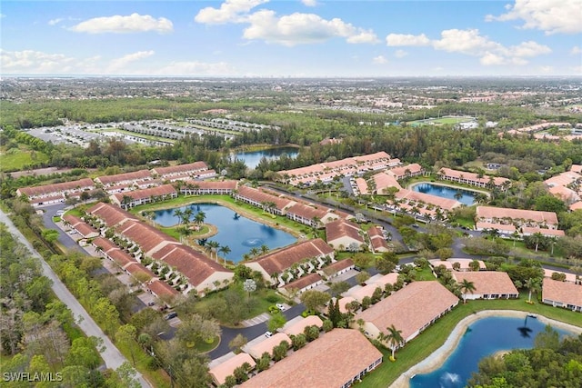 aerial view with a water view and a residential view