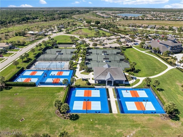 bird's eye view with a water view