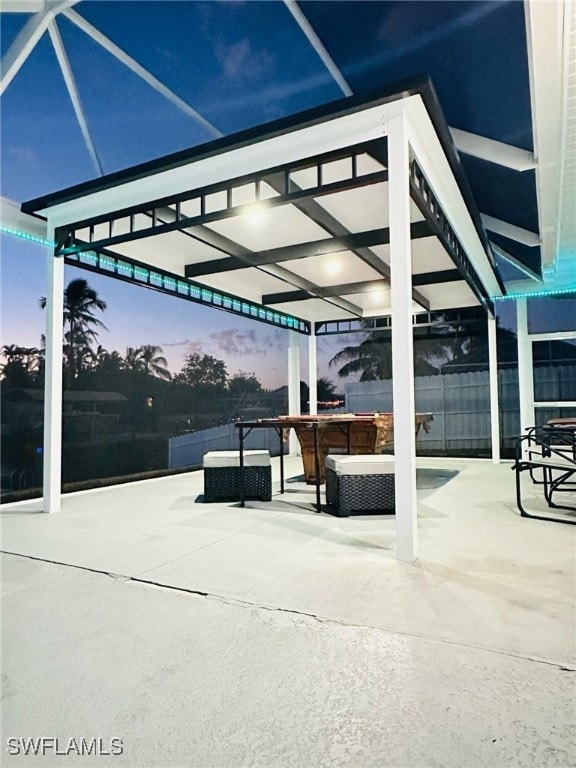 view of patio featuring fence